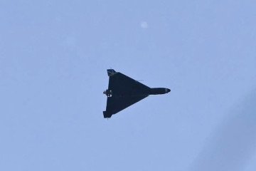 A Russian drone flies above Kyiv during Russian strikes to the Ukrainian capital on May 24, 2026. Illustrative photo. (Source: Getty Images)