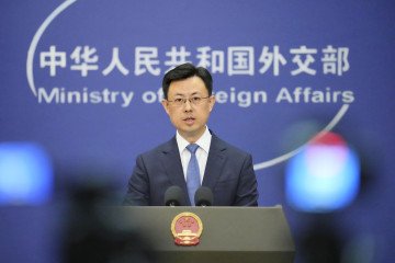 Chinese Foreign Ministry spokesman Guo Jiakun speaks at a press conference in Beijing on May 18, 2026. (Source: Getty Images)