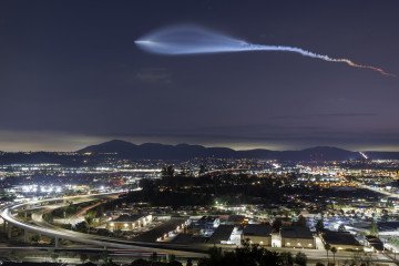 Illustrative image. A SpaceX Falcon 9 rocket carrying a payload of 24 Starlink internet satellites soars into space after launching from Vandenberg Space Force Base on July 18, 2025, seen from Santee, California. (Source: Getty Images)