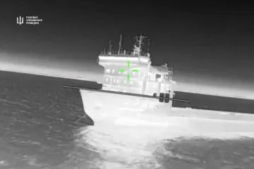 Close-up drone view of a Russian ferry targeted during a Ukrainian intelligence operation against vessels supporting Russia’s military logistics network. (Source: HUR)