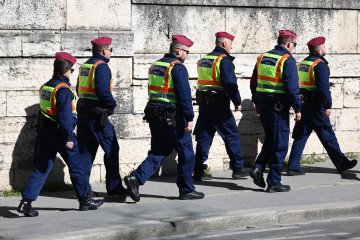 Police officers walk in Budapest, Hungary on April 7. (Source: Getty Images)