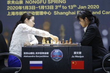 Aleksandra Goryachkina of Russia competes against Ju Wenjun of China during the 2020 International Chess Federation Women's World Chess Championship in Shanghai on January 11, 2020. (Source: Getty Images)