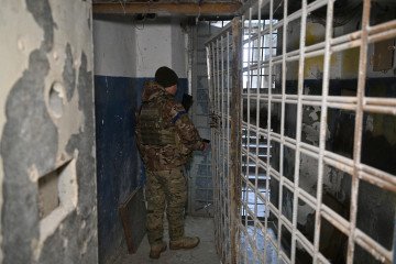 20-Year-Old Russian Guard Gets Sentence in Absentia for Torture of Civilians in Kherson