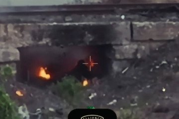 Drone footage shows a Russian soldier reportedly hiding alongside a fallen comrade beneath a concrete structure near Dobropillia, Donetsk region. (Source: 20th Liubart Brigade)