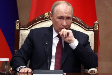 Russian leader Vladimir Putin grimaces on November 26, 2025.