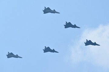 Illustrative photo: Chinese J-20 fighter jets fly in formation during a military parade in Beijing marking the 80th anniversary of the end of World War II, September 3, 2025. (Source: Getty Images)