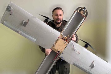 Serhii “Flash” Beskrestnov with the downed Russian Molniya drone. (Source: Serhii “Flash” Beskrestnov/Facebook)