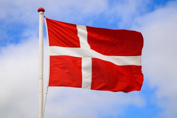 Russia Shifts Strategy to Direct Sabotage Against Danish Suppliers Fueling Ukraine’s Defense The Danish national flag. (Source: Getty Images)
