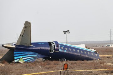 Evidence collection efforts are underway at the crash site of an Azerbaijan Airlines (AZAL) passenger plane near Aktau, Kazakhstan, on December 27, 2024. (Source: Getty Images)