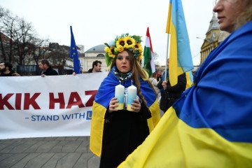 A protester is holding candles at a protest marking the second anniversary of the Russian invasion of Ukraine, in Budapest, Hungary on February 24, 2024. (Source: Getty Images) A protester is holding candles at a protest marking the second anniversary of the Russian invasion of Ukraine, in Budapest, Hungary on February 24, 2024. (Source: Getty Images)
