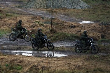 Russian troops ride motorcycles during CSTO military drills in Russia’s Chelyabinsk region on October 2, 2026. (Source: Getty Images)