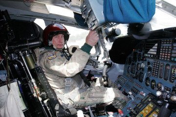 Russian leader Vladimir Putin sits in the cockpit of a Tu-160 strategic bomber at a military airfield outside Moscow. (Source: Getty Images)