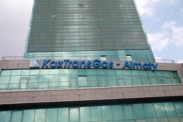 Russia Turns to Kazakhstan for Gasoline as Refining Output Falls Amid Supply Strain A sign hangs outside the headquarters of AO KazTransGas in Almaty, Kazakhstan. (Source: Getty Images)