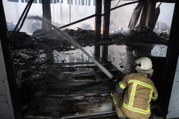 Russian Attack on Bucha District Enterprise Kills 27, Injures 42 Aftertmath of a Russian drone attack on August 27, 2026. (Source: Getty Images)