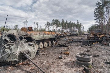 A column of destroyed Russian military equipment stands on a road on April 4, 2022, in the Kyiv region, Ukraine. (Source: Getty Images)
