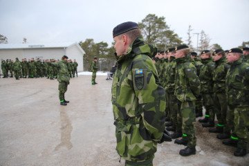 Swedish soldiers stand in formation during a ceremony marking the reactivation of the Gotland Regiment on Gotland Island, part of Sweden’s efforts to strengthen defenses in the Baltic region. (Source: Getty Images) Swedish soldiers stand in formation during a ceremony marking the reactivation of the Gotland Regiment on Gotland Island, part of Sweden’s efforts to strengthen defenses in the Baltic region. (Source: Getty Images)