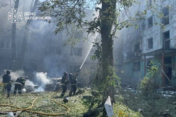 Firefighters from Ukraine’s State Emergency Service (DSNS) work to extinguish a blaze at a damaged residential building following a Russian guided bomb strike on Zaporizhzhia on August 10. (Source: DSNS Zaporizhzhia)