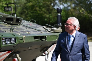 Rheinmetall CEO Armin Papperger, previously targeted in a reported Russian assassination plot, tours the company’s factory in Kassel, Germany, on August 27, 2026. (Source: /Getty Images)