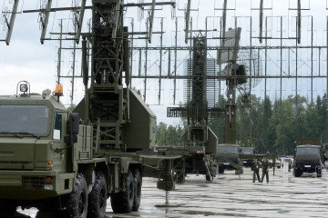 Russian Army officers pass radar systems on display at the Army-2015 international military forum in Kubinka, outside Moscow, on June 16, 2015. (Source: Getty Images)