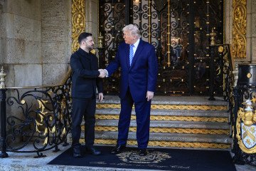 US President Donald Trump greets Ukrainian President Volodymyr Zelenskyy at his Mar-a-Lago club on December 28, 2025, in Palm Beach, Florida. (Source: Getty Images)
