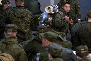 Russian citizens drafted during the mobilization are seen being dispatched to combat coordination areas after a military call-up for the Russia-Ukraine war in Moscow, Russia on October 10, 2022. (Source: Getty Images)