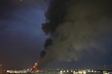 Fire and heavy smoke over an industrial area in Taganrog after a reported missile strike, April 19, 2026. (Source: Ukrainian Navy)