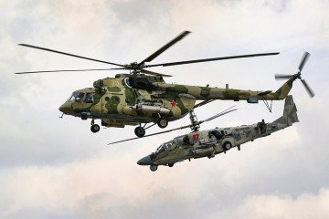 A Russian Mi-8 (front) and Ka-52 attack helicopter (rear) during training. (Photo: Russian military)
