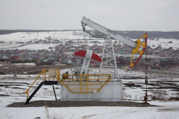 An oil pumping jack, also known as “nodding donkey”, stands in an oilfield near Almetyevsk, Tatarstan, Russia, on March 11, 2020. (Source: Getty Images)