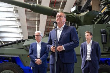 Federal Minister of Defense Boris Pistorius (M, SPD) speaks during his visit to the defense contractor KNDS at its Kassel facility. In the background is an RCH 155 (Remote Controlled Howitzer 155 mm) self-propelled artillery piece. (Source: Getty Images) Federal Minister of Defense Boris Pistorius (M, SPD) speaks during his visit to the defense contractor KNDS at its Kassel facility. In the background is an RCH 155 (Remote Controlled Howitzer 155 mm) self-propelled artillery piece. (Source: Getty Images)