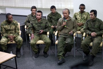 Foreign prisoners of war from Cuba, Nepal, Sierra Leone, and Somalia, captured while fighting for Russian forces, attend a press conference in Kyiv, Ukraine, March 15, 2024. (Source: Getty Images)