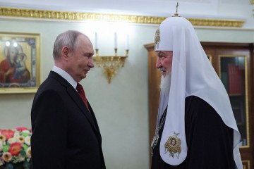 Russia’s leader Vladimir Putin congratulates Russia’s Orthodox Patriarch Kirill on his name day, in Moscow on May 24, 2026. (Source: Getty Images)