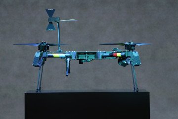 A “Linza” drone stands illuminated in blue light at the production facility of Quantum Frontline Industries prior to a visit by Ukrainian President Volodymyr Zelenskyy on February 13, 2026 near Munich, Germany. (Source: Getty Images)