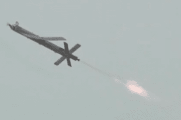 Modified Shahed-101 loitering munition launching with a rear-mounted rocket booster, showing its fixed-wing design and X-shaped tail stabilizers during flight. (Source: Mohammed al-Basha)