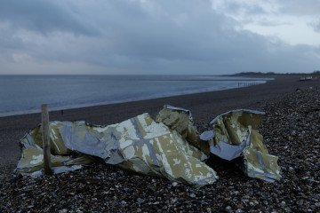 Suspected Russian Missile Debris Found Washing Ashore on Northern Norwegian Coast Debris on the seashore. Illustrative image. (Source: Getty Images)
