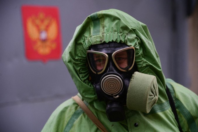 A Russian serviceman disinfects a bus in Vladivostok, Russia, June 4, 2020. (Source: Getty Images) A Russian serviceman disinfects a bus in Vladivostok, Russia, June 4, 2020. (Source: Getty Images)
