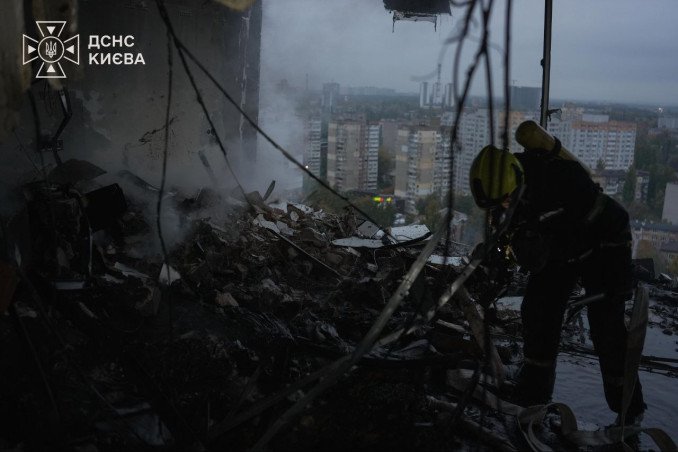 Ukrainian SES rescuer at the site of a Russian airstrike on a high-rise in Kyiv, October 21, 2026.