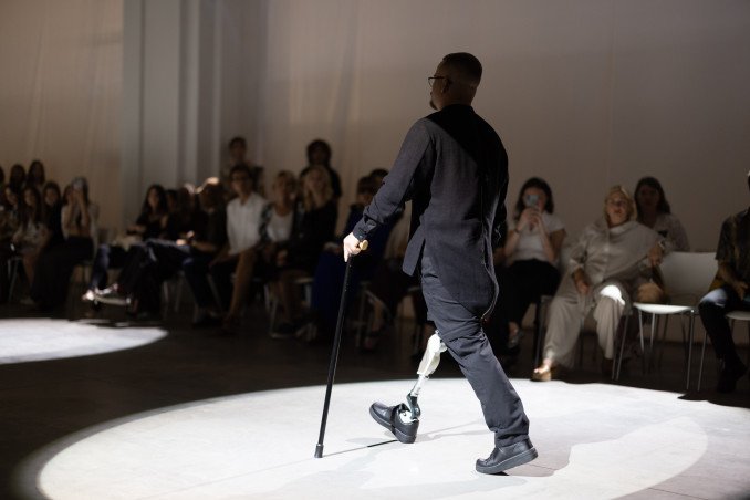 A Ukrainian veteran from the Azov Brigade presents a look from the JULIYA KROS SS2027 RECONSTRUCTION collection during Ukrainian Fashion Week in Kyiv on September 4, 2026. (Source: Vic Bakin/UNITED24 Media)