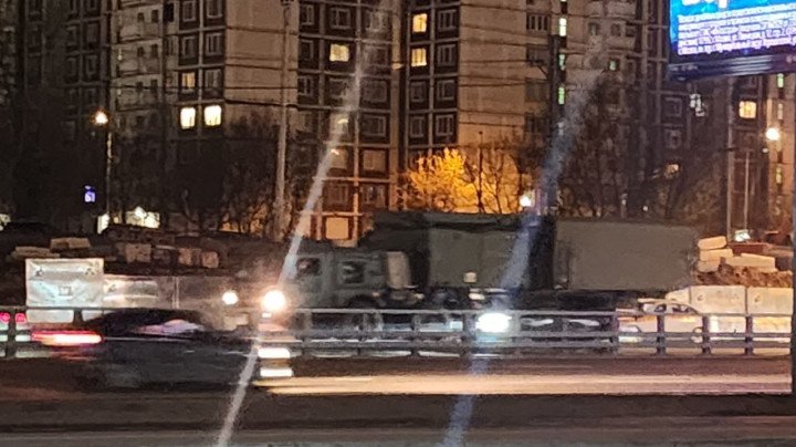 Military vehicle, likely part of an S-400 air defense system, seen moving through Moscow at night. (Photo: Open source)