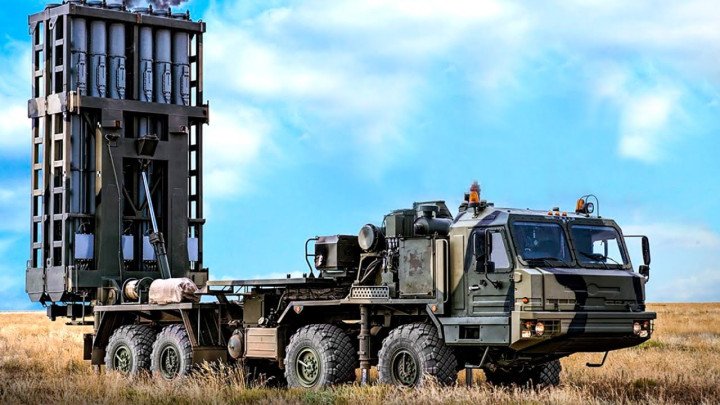 A Russian S-350 Vityaz air defense system shown deployed in a field with its vertical launch module raised. (Photo: Open source)