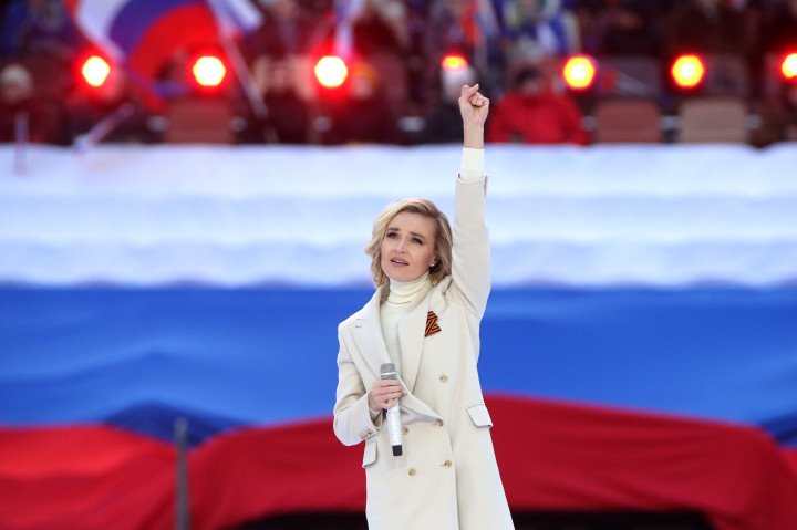 Russian pop singer Polina Gagarina performs during a concert marking the anniversary of the annexation of Crimea, on March 18, 2022, in Moscow, Russia. (Source: Getty Images) Russian pop singer Polina Gagarina performs during a concert marking the anniversary of the annexation of Crimea, on March 18, 2022, in Moscow, Russia. (Source: Getty Images)