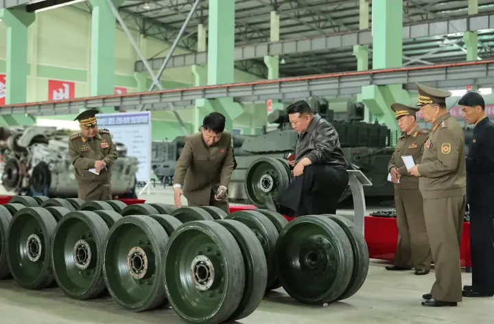 Kim Jong Un reviews tank road wheels and components at a military factory amid efforts to modernize North Korea’s armored forces. (Source: KCNA) Kim Jong Un reviews tank road wheels and components at a military factory amid efforts to modernize North Korea’s armored forces. (Source: KCNA)
