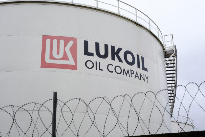 As of November 2025, Lukoil is reeling under severe U.S. and Western sanctions, which have forced the company to divest international assets and halt operations at major projects. (Photo by Thierry Monasse/Getty Images)