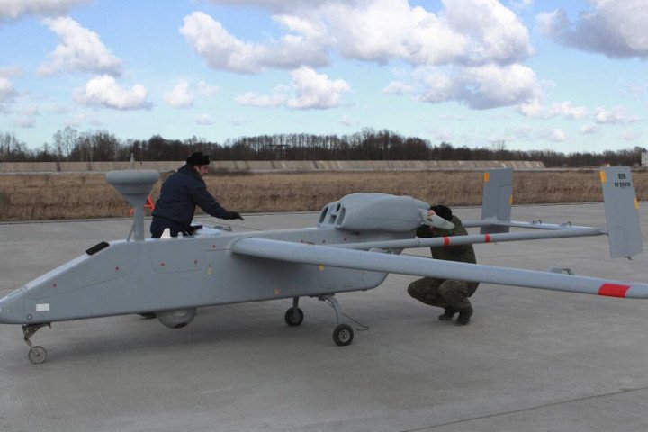 Russian ground crew prepares a Forpost reconnaissance and strike UAV for takeoff. (Source: Russian media) Russian ground crew prepares a Forpost reconnaissance and strike UAV for takeoff. (Source: Russian media)