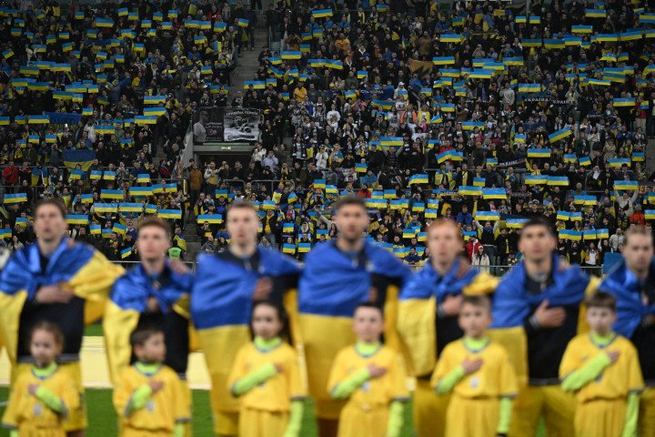 Ukrainian fans attend the UEFA’s EURO 2024 qualification final play off football match between Ukraine and Iceland, in Wroclaw, Poland, on March 26, 2024. (Photo by Sergei GAPON / AFP) (Photo by SERGEI GAPON/AFP via Getty Images)