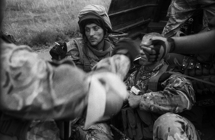 Voluntiers of the “Donbas” battalion in the evening after a sweep operation in the village of Hrabske. On the eve of the assault on Ilovaisk. August 18, 2014. Photo: Oleksandr Glyadyelov 