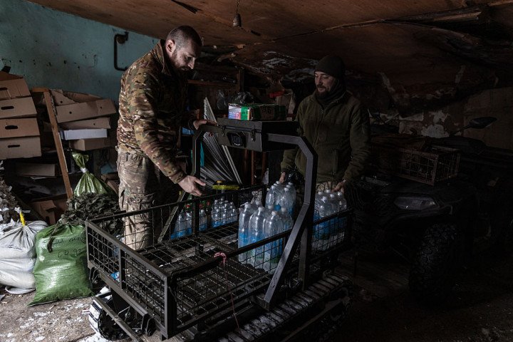 Ukrainian soldiers from the 93rd Brigade use robot for a logistic purpose. (Photo by Diego Herrera Carcedo/Anadolu via Getty Images)