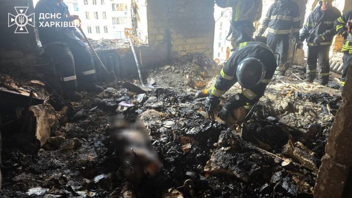 Ukrainian emergency workers search through the charred remains of a destroyed apartment after the strike, where victims were found under the rubble. (Source: State Emergency Service of Ukraine) Ukrainian emergency workers search through the charred remains of a destroyed apartment after the strike, where victims were found under the rubble. (Source: State Emergency Service of Ukraine)