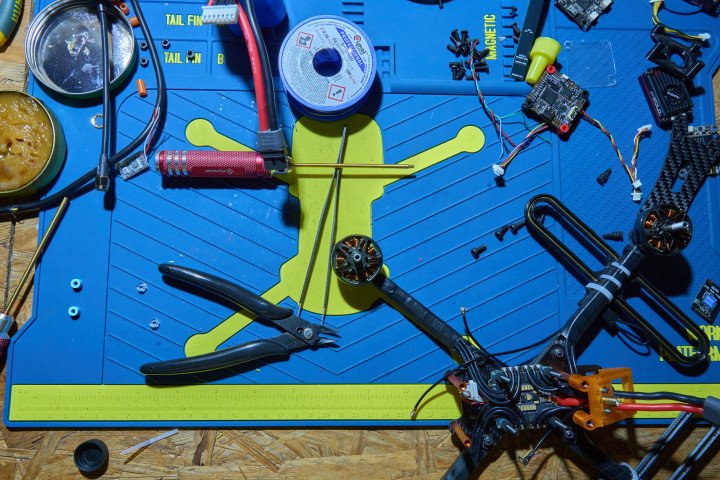 Custom FPV drone parts on the workbench inside the K-2 engineering bay. (Source: UNITED24 Media) Custom FPV drone parts on the workbench inside the K-2 engineering bay. (Source: UNITED24 Media)