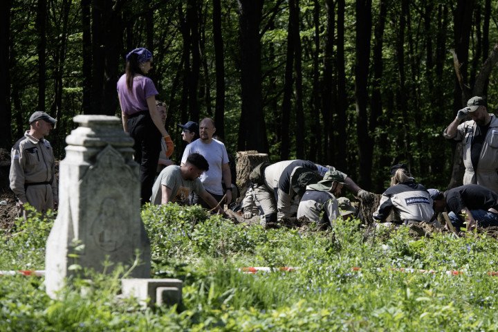 Polish archaeologists work at the exhumation site of the World War II Volhynia Tragedy near the village of Puzniki, Ternopil region, Ukraine, on April 25, 2025. (Photo by VLADYSLAV MUSIIENKO/AFP via Getty Images) Polish archaeologists work at the exhumation site of the World War II Volhynia Tragedy near the village of Puzniki, Ternopil region, Ukraine, on April 25, 2025. (Photo by VLADYSLAV MUSIIENKO/AFP via Getty Images)