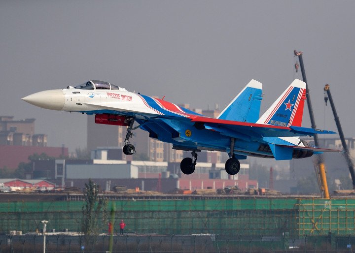 A Sukhoi Su-35S multirole fighter jet from the Russian Knights aerobatic team arrives at Taiyuan Wusu International Airport in China en route to the 15th China International Aviation and Aerospace Exhibition in Zhuhai, November 7, 2024. (Source: Getty Images)